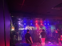 a group of people on stage at a concert